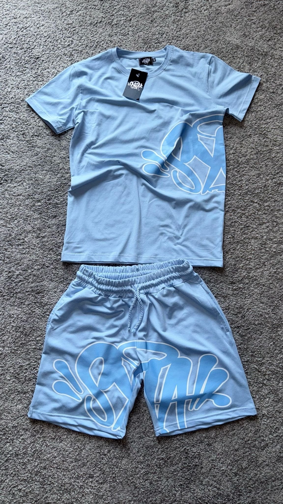 Conjunto Syna World camiseta y pantalón corto — Azul cielo