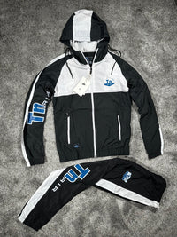 Chándal cortavientos Nike — Negro y blanco