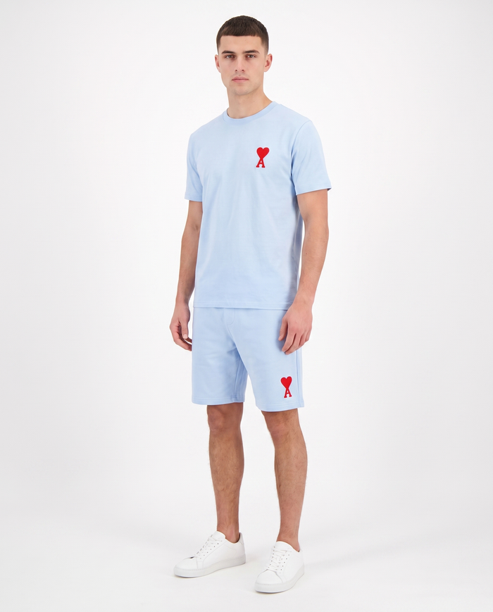 Conjunto camiseta y pantalón corto Ami Paris — Azul celeste