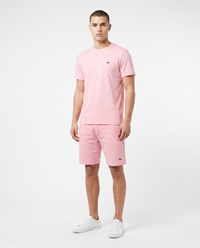Conjunto camiseta y pantalón corto Lacoste — Rosa