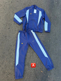 Chándal cortavientos Nike — Azul marino y celeste