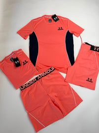 Conjunto Under Armour camiseta y pantalón corto — Coral