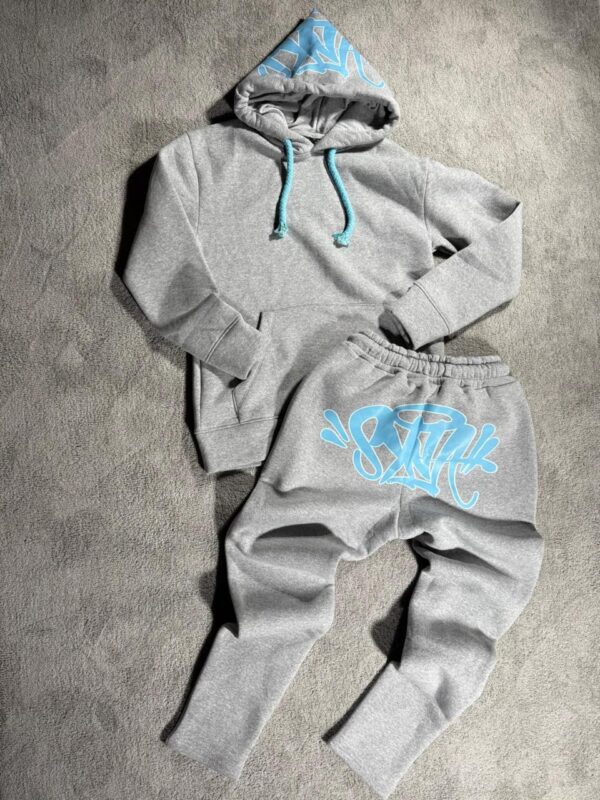 CHANDAL LARGO SYNA WORLD GRIS Y CELESTE